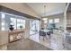 Elegant dining room with glass table and patio access at 525 Summer Mesa Dr, Las Vegas, NV 89144