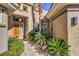 Welcoming entry with lush landscaping and walkway at 525 Summer Mesa Dr, Las Vegas, NV 89144