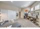 Spacious living area with built-in shelving, comfortable seating, and plenty of natural light at 525 Summer Mesa Dr, Las Vegas, NV 89144