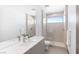 Contemporary bathroom with double vanity, sleek fixtures, and a glass-enclosed shower at 612 Dragon Mountain Ct, Henderson, NV 89012