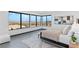 Bright primary bedroom boasts expansive windows with stunning city views and modern design at 612 Dragon Mountain Ct, Henderson, NV 89012