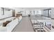 Upper level game room with ping pong, foosball, and comfortable seating overlooks the kitchen at 612 Dragon Mountain Ct, Henderson, NV 89012