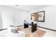 Bright home office with modern decor, comfortable seating, and ample workspace at 612 Dragon Mountain Ct, Henderson, NV 89012