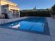 Community swimming pool with ample deck space at 10201 Clark Wooldridge Ct, Las Vegas, NV 89129