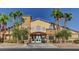Community center with palm trees and welcoming entrance at 5591 La Perla Ct, Las Vegas, NV 89122