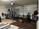 Finished garage with home gym setup at 5591 La Perla Ct, Las Vegas, NV 89122