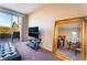 Comfortable bedroom with sliding glass doors to backyard at 5904 Sorto Lago St, North Las Vegas, NV 89081