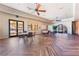 Community room with tables, chairs, and herringbone floors at 5904 Sorto Lago St, North Las Vegas, NV 89081