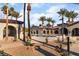 Resort-style pool with palm trees and seating at 5904 Sorto Lago St, North Las Vegas, NV 89081
