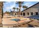 Community pool and spa with palm trees and benches at 5904 Sorto Lago St, North Las Vegas, NV 89081