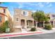 Charming two-story home featuring a stucco facade, well-maintained landscaping, and covered entry at 10332 Perfect Parsley St, Las Vegas, NV 89183