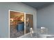 Balcony with table overlooking the living room and kitchen at 211 E Flamingo Rd # 610, Las Vegas, NV 89169