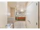 Bright bathroom featuring double sinks, granite counters and shower at 211 E Flamingo Rd # 610, Las Vegas, NV 89169