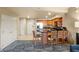 View of the kitchen with stainless steel appliances and a breakfast bar with chairs at 211 E Flamingo Rd # 610, Las Vegas, NV 89169
