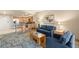 Cozy living room featuring comfortable seating, a modern kitchenette, and a view of the exterior landscape at 211 E Flamingo Rd # 610, Las Vegas, NV 89169