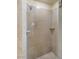 Close up of tiled shower with built in shelf at 211 E Flamingo Rd # 610, Las Vegas, NV 89169