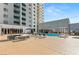 Outdoor pool with lounge chairs and inviting seating areas, perfect for relaxation and recreation at 211 E Flamingo Rd # 610, Las Vegas, NV 89169