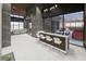 Stylish bar area featuring a modern design and views into the garage, showcasing luxury cars at 491 Cityview Ridge Dr, Henderson, NV 89012