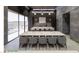Elegant dining area featuring a large table and a view of the outdoor lounge at 491 Cityview Ridge Dr, Henderson, NV 89012