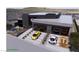 Modern home with parking for multiple cars and landscaped with desert plants at 491 Cityview Ridge Dr, Henderson, NV 89012