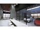 Contemporary living space offering views of the luxury car garage through large glass walls and open design at 491 Cityview Ridge Dr, Henderson, NV 89012