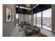 Bright primary bedroom featuring floor to ceiling windows, ensuite patio, and modern design elements at 491 Cityview Ridge Dr, Henderson, NV 89012