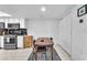 Small dining area with wooden table and chairs at 5330 Duralite St # 102, Las Vegas, NV 89122