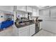 Kitchen with double sink and view of living room at 5330 Duralite St # 102, Las Vegas, NV 89122