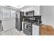 Kitchen with stainless steel appliances and microwave at 5330 Duralite St # 102, Las Vegas, NV 89122