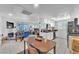 Open floor plan showing kitchen, living room, and dining area at 5330 Duralite St # 102, Las Vegas, NV 89122