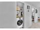 Compact laundry closet with washer and dryer at 5330 Duralite St # 102, Las Vegas, NV 89122