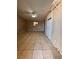 Bright bedroom with tile flooring and ample closet space at 1504 E Mcwilliams Ave, Las Vegas, NV 89101