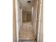 Inviting entryway with tile floors and built-in storage at 1504 E Mcwilliams Ave, Las Vegas, NV 89101