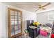Bedroom with double bed, ceiling fan, and storage at 3968 Mont Blanc Way, Las Vegas, NV 89124