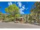 House exterior showcasing a wooden cabin in a mountain setting at 3968 Mont Blanc Way, Las Vegas, NV 89124