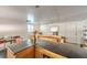 Kitchen with granite island, wood cabinets, and view of living room at 3968 Mont Blanc Way, Las Vegas, NV 89124