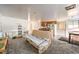Open living room with futon and view into kitchen at 3968 Mont Blanc Way, Las Vegas, NV 89124