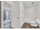 The bright bathroom features a sink and toilet, plus a tub and shower at 3427 Manzano Cir, Las Vegas, NV 89121