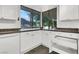 Kitchen features white cabinetry and countertops, complemented by a spacious sink and a full suite of appliances at 3427 Manzano Cir, Las Vegas, NV 89121