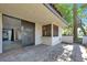 Charming covered patio area with tile flooring and easy access to the home's interior at 3427 Manzano Cir, Las Vegas, NV 89121