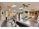 Modern on-site gym with treadmills, weights, and mirrored walls at 498 Canyon View Way, Mesquite, NV 89027