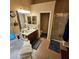 Bright bathroom featuring dual sinks, a bathtub, and a separate glass-enclosed shower at 11261 Playa Caribe Ave, Las Vegas, NV 89138