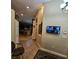 Welcoming entryway with tiled floor, featuring a security monitor and chandelier lighting at 11261 Playa Caribe Ave, Las Vegas, NV 89138