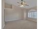 Spacious bedroom with vaulted ceiling and ceiling fan at 3767 Darren Thornton Way, Las Vegas, NV 89120