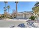 Single-story house with three-car garage, tile roof, and landscaping at 3767 Darren Thornton Way, Las Vegas, NV 89120