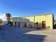 Large outbuilding with an adjacent storage shed and parking area at 555 Cooper St, Overton, NV 89040