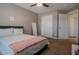 Bright bedroom with double bed and ample closet space at 10111 Aspen Rose St # 101, Las Vegas, NV 89183