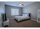 Well-lit bedroom featuring a comfortable double bed and carpet flooring at 10111 Aspen Rose St # 101, Las Vegas, NV 89183