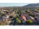 Aerial view of a residential neighborhood with lush landscaping and mature trees, showing the home's desirable location at 11605 Cabo Del Sol Ct, Las Vegas, NV 89138