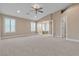 Large main bedroom featuring recessed lighting, plush carpet, and multiple windows at 11605 Cabo Del Sol Ct, Las Vegas, NV 89138